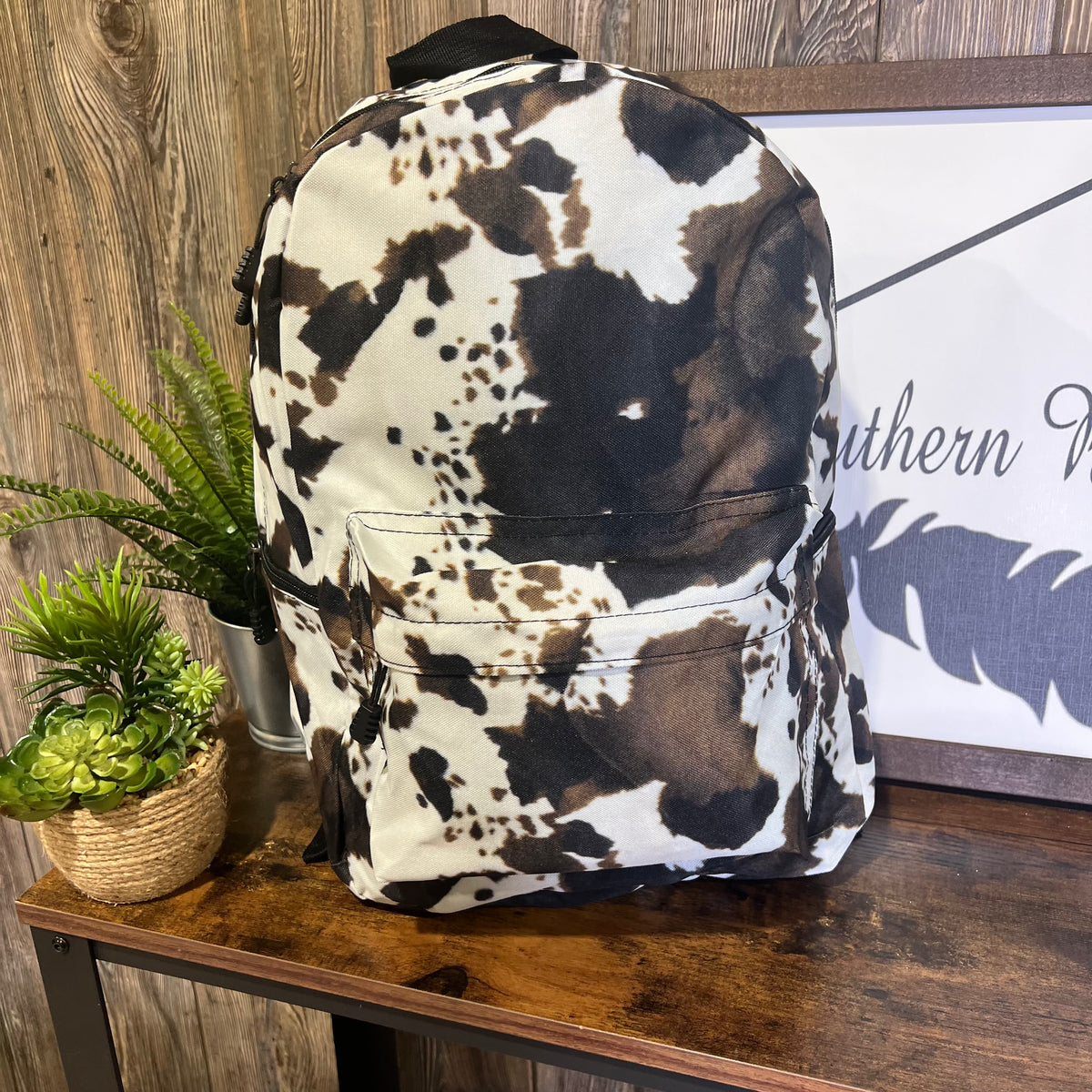 Cow print backpack sales